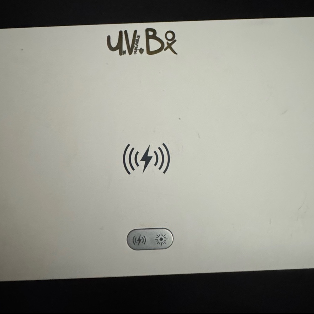 White Wireless Charging iPhone and phone disinfecting station